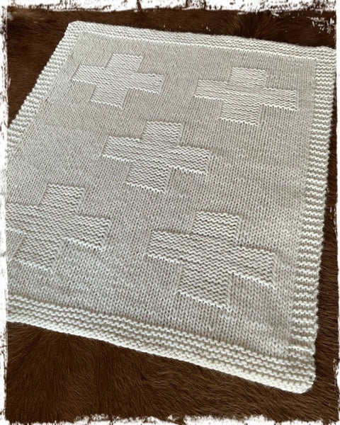 The Kiwi Stitch and Knit Co Chunky Cross Rug and Cushion.