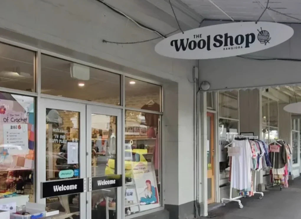 Inside The Wool Shop Rangiora, showing yarn displays and a welcoming shop interior