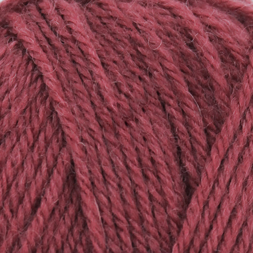 Close-up of a ball of red Broadway Purely Wool DK 8 Ply yarn