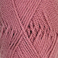 A close up of pink Crucci Luxury Merino Crepe 8 Ply yarn