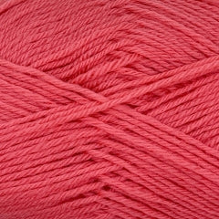 A close up of Crucci Soft Pure Wool 4 Ply yarn in shade salsa