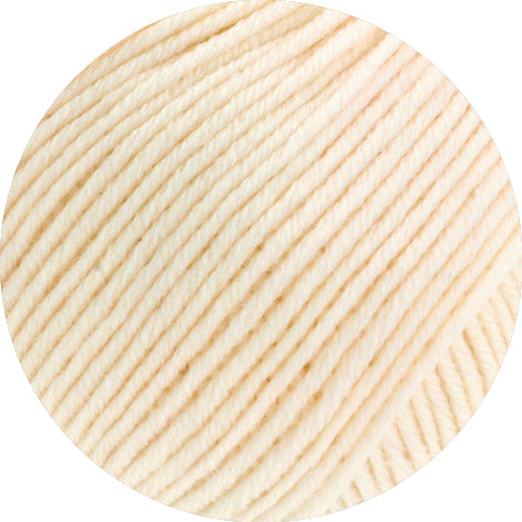 Close-up of beige yarn on a white background