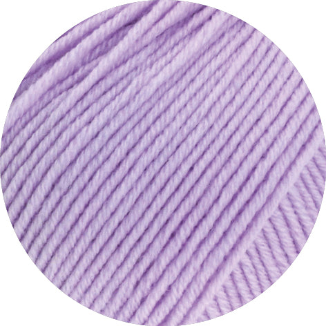 Close-up of purple yarn on a white background