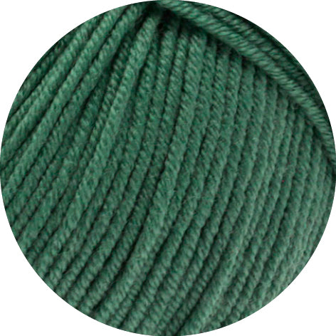 Close-up of green yarn on a white background