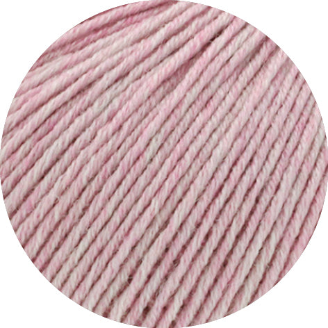 Close-up of pink yarn with a white background
