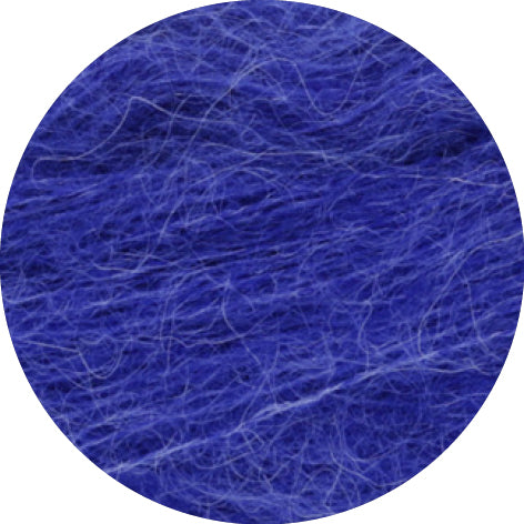 Close-up of blue yarn on a white background