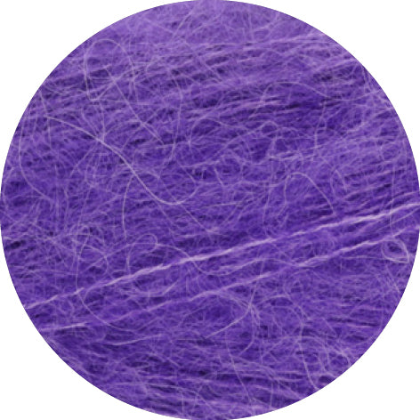 Close-up of purple yarn with a textured surface