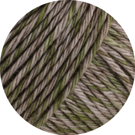 Close-up of green and beige Lana Grossa Vintage Chunky yarn in shade pink