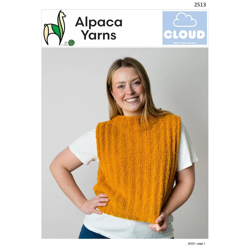 Woman wearing an orange knitted vest with Alpaca Yarns and Cloud branding.
