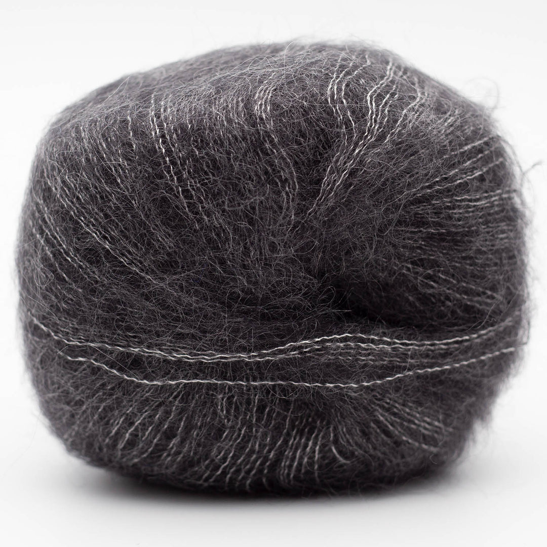 Ball of dark gray Silky Kid yarn on a white background - The Wool Shop NZ