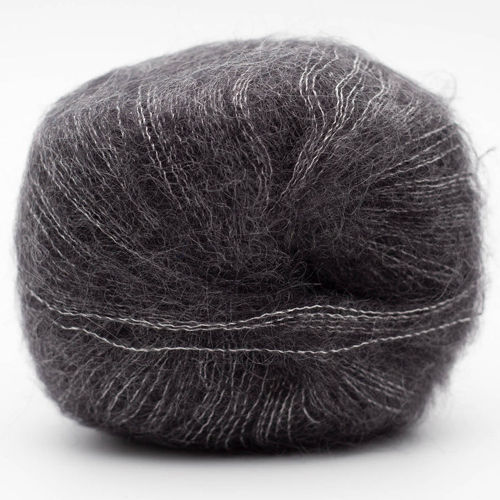 Ball of dark gray Silky Kid yarn on a white background - The Wool Shop NZ