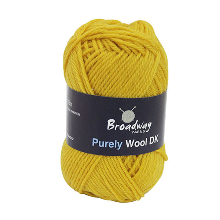 A skein of Broadway Purely Wool DK yarn in yellow color.