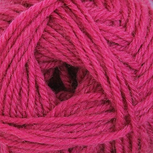 A close up of Broadway Purely Wool DK 8 Ply yarn in shade fuschia