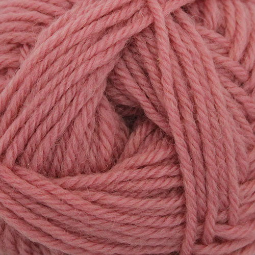 A close up of Broadway Purely Wool DK 8 Ply yarn in shade rose