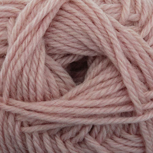 A close up of Broadway Purely Wool DK 8 Ply yarn in shade vintage pink