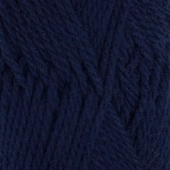 A close up of Crucci Luxury Merino Crepe 8 Ply yarn in shade navy