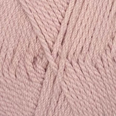 A close up of Crucci Luxury Merino Crepe 8 Ply yarn in shade shell pink