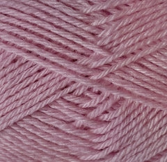 A close up of pink Crucci Soft Pure Wool 4 Ply yarn