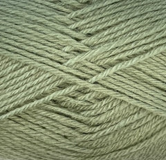 A close up of light green Crucci Soft Pure Wool 4 Ply yarn