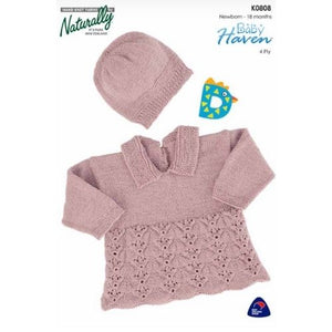 A set of pink baby clothing, including a sweater and a hat, with a yarn pattern guide and a brand tag showing 'Naturally' and 'Baby Haven'.