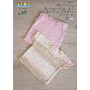 Two knitted tops for kids, one in pink and the other in a beige and pink striped design, laid flat on a wooden surface.